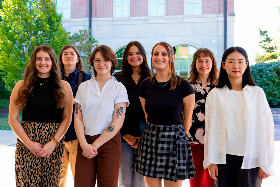 ARC associates standing outside